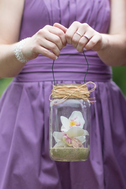bridesmaid bouquet alternative. flowers seashells and sand in mason jar