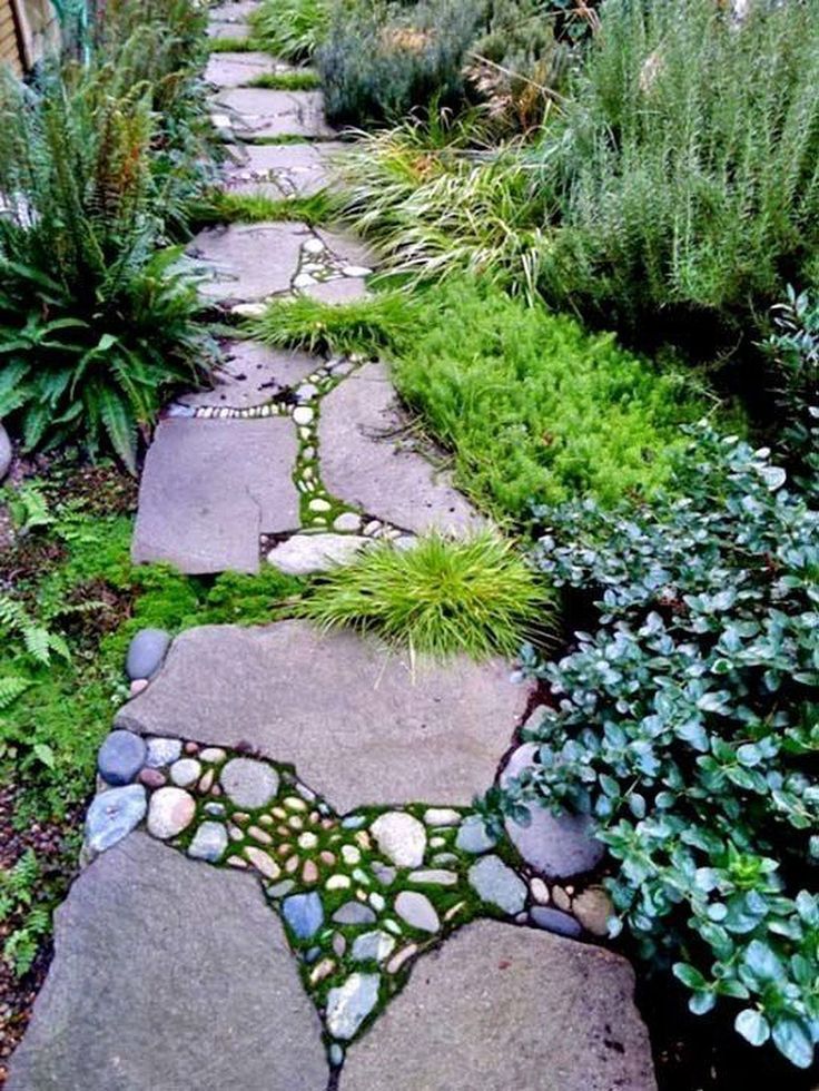 Lush Gardens Surround This Pathway Of Flagstone Rocks And Moss Stone lush-gardens-surround-this-pathway-of-flagstone-rocks-and-moss-stone