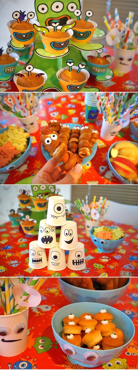 the table is set up for a birthday party with many different foods and decorations on it