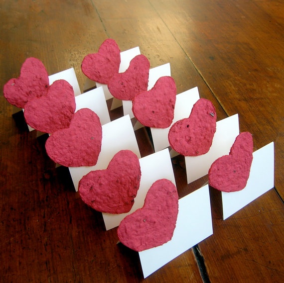 pink plantable paper heart on a place card tent valentines place cards