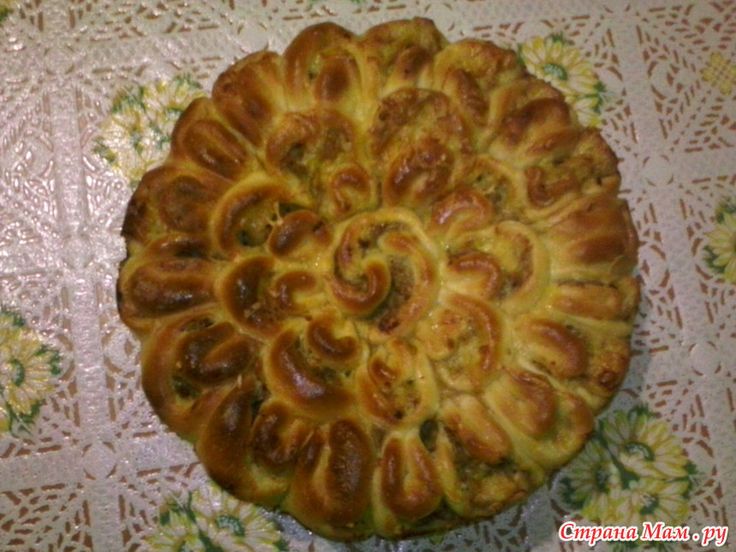 a close up of a pastry on a doily