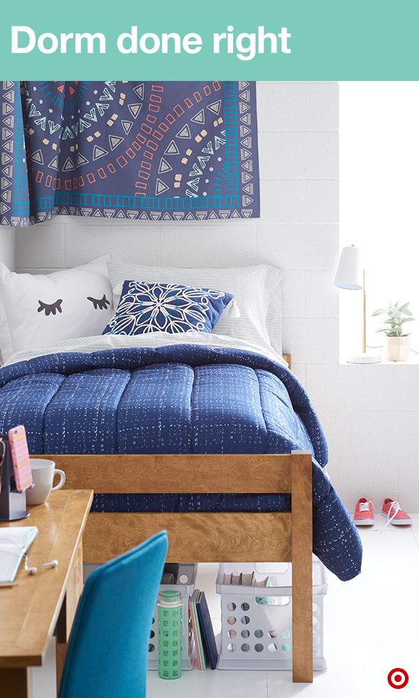 Let’s talk about dorm room style. Find a coordinating comforter and sheets in XLT (you’ll want these for the extra-long beds). Then add interest to your walls with a tapestry. It will soften and warm up any space. Now you just have to move in and meet the roomie. Then make compact dorm living easy by using of every inch of space. Bins under your bed are the perfect place to organize extra clothes, shoes, school supplies and books.