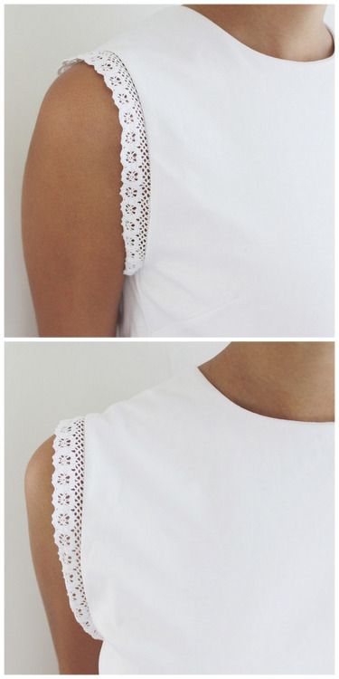 the back of a woman's white top with crochet trimmings