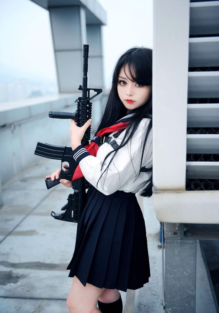 Asian girl with gun