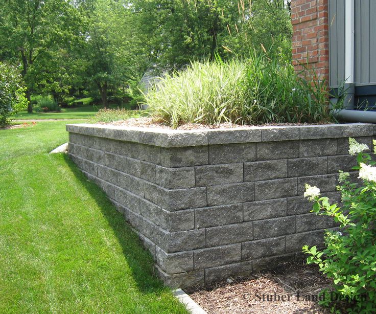 Landscape Wall Constructed Using Versa Lok Retaining Systems Sloped Garden Landscaping Walls - How Much Does A Versa Lok Retaining Wall Cost Landscape Wall Constructed Using Versa Lok Retaining Systems Sloped Garden Landscaping Walls - How Much Does A Versa Lok Retaining Wall Cost