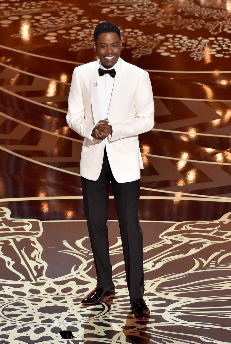 The 88th Annual Academy Awards Host Chris Rock Wearing A Custom Burberry Tuxedo With Satin The 88th Annual Academy Awards Host Chris Rock Wearing A Custom Burberry Tuxedo With Satin