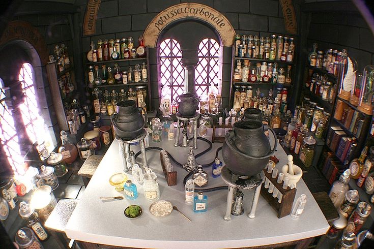 an aerial view of a bar with many bottles on the counter