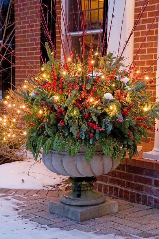Add Lights To Decorative Urns For Added Glow Next Your Front Door Add Lights To Decorative Urns For Added Glow Next Your Front Door Holiday Outdoor Decorating Tips From Mariani L Curb Eal With