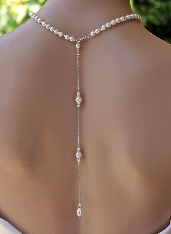 Great Pearl back drop necklace has been designed with beads, crystals and … Great Pearl back drop necklace has been designed with beads, crystals and …