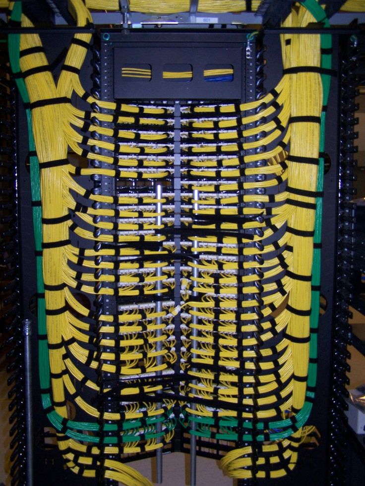 the inside of a server with many wires and cables attached to each side