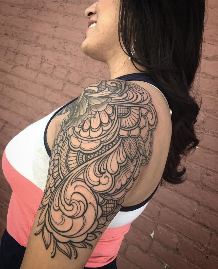 Ornamental line work addition to a shoulder cap by