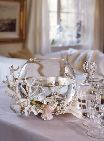 Un bocal décoré de coquillages Deco coquillage Idee
