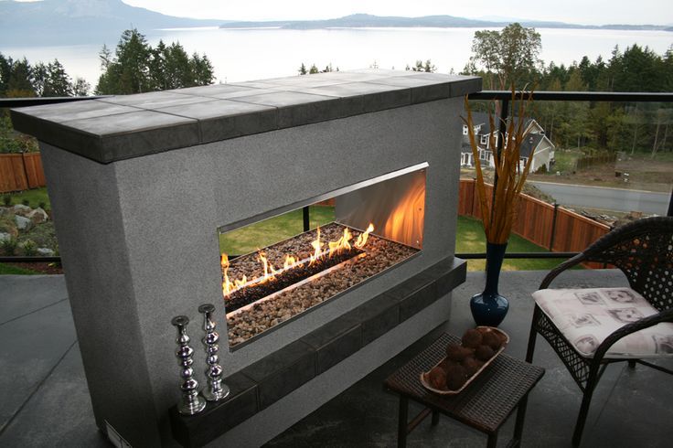 outdoor fireplace 2 sided | modern double sided outdoor fireplaces - Google Search | Cave | Pinterest | Modern Outdoor living areas and Sunroom