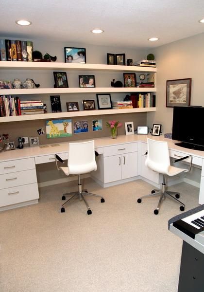 This striking, contemporary home office space feels as luxurious as it is functional. The This striking, contemporary home office space feels as luxurious as it is functional. The