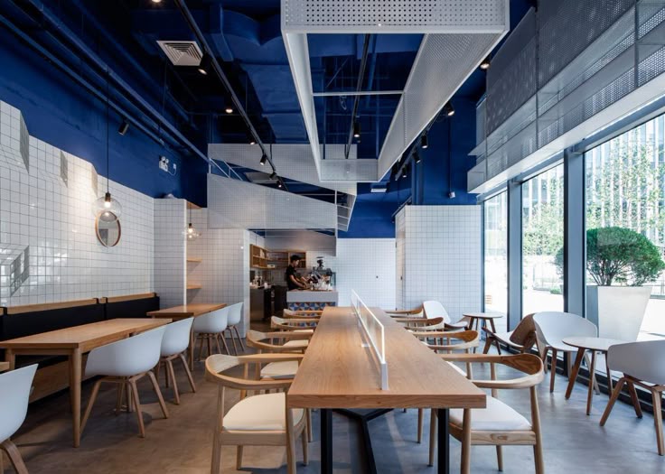 swimming pool studio aimed to bring the relaxing and refreshing hues of blue sea restaurant designshanghaicafe