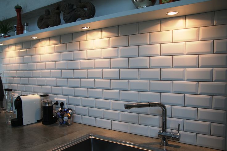 the kitchen counter is clean and ready to be used as a wallpaper or backsplash