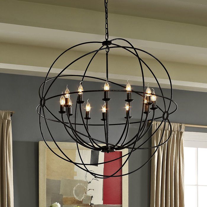 15 Industrial Farmhouse Chandeliers For A Tight Budget Spin an orbit of appeal with the Vintage Modern Geyer Chandelier. Made of steel and positions for twelve 25-w… | Globe chandelier, Ceiling lights, Candle chandelier