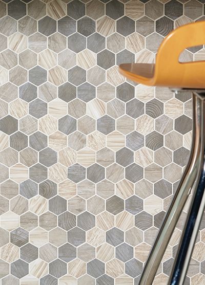 photo features crosswood pelican in hexagonal glass mosaic on the wall