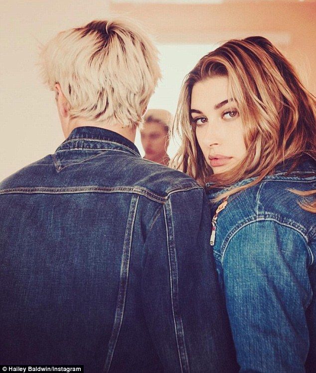 Hailey Baldwin dons Baywatch-inspired GCDS swimsuit poolside in Miami