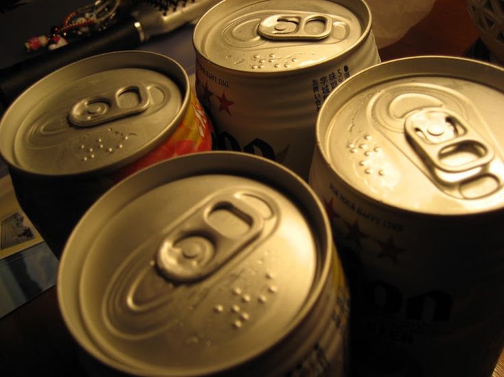 Pattern from Much of Drinking Cans of Beer. Metal Beer Cans Background Stock Ima