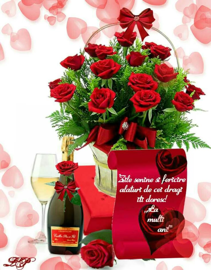 red roses in a basket with wine and greeting card