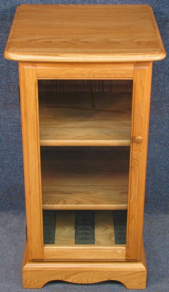 Ercol Solid Elm Glass Door Narrow Hi Fi Cabinet In Light Finish