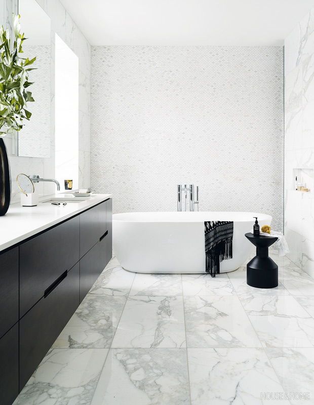 Tour A Black White Bathroom Adorned With Marble Marble Bathroom Designs Black White Bathrooms Modern White Bathroom