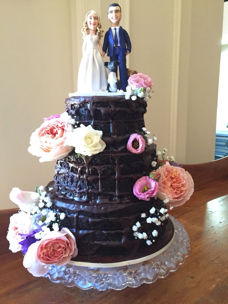 Rustic Wedding Cake Chocolate With Ganache Filling And Fresh Flowers Rustic Wedding Cake Chocolate With Ganache Filling And Fresh Flowers