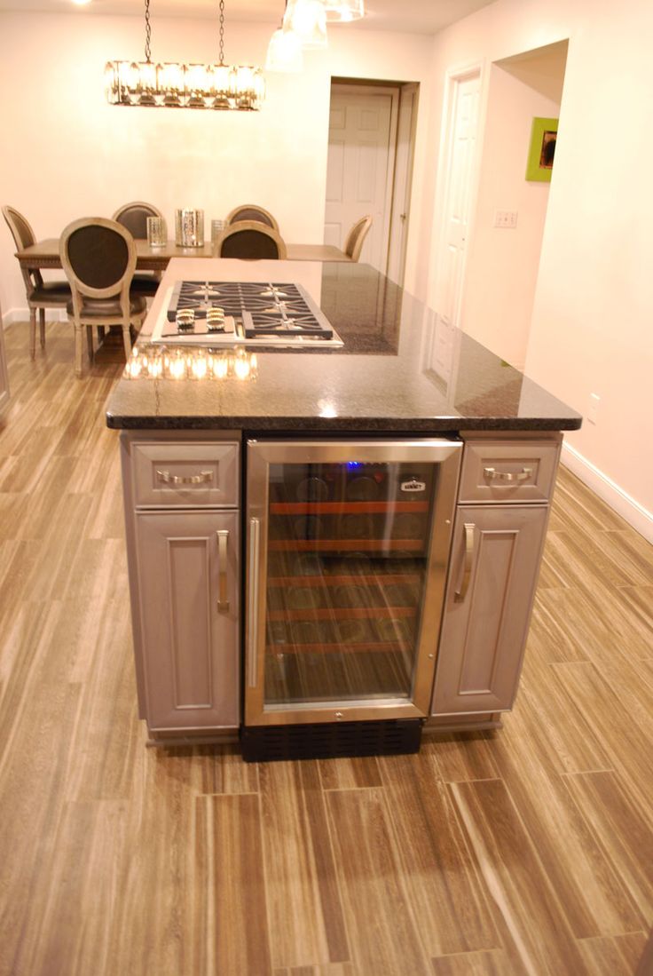 32 Best Kitchens Gray Images On Pinterest Cabinet Colors Designer Emeil Soryal Chose Starmark Cabinetry S Princeton Door In Cherry Finished A Light Gray Cabinet Color Called Driftwood