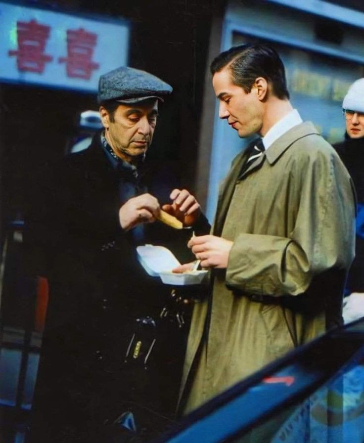 Al Pacino and Keanu Reeves having lunch together on the set of “The