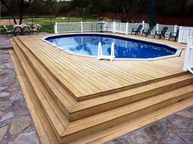 Above Ground Pool With A Wood Deck In San Antonio Texas Above Ground Swimming Pools Backyard Pool Pool Deck Plans