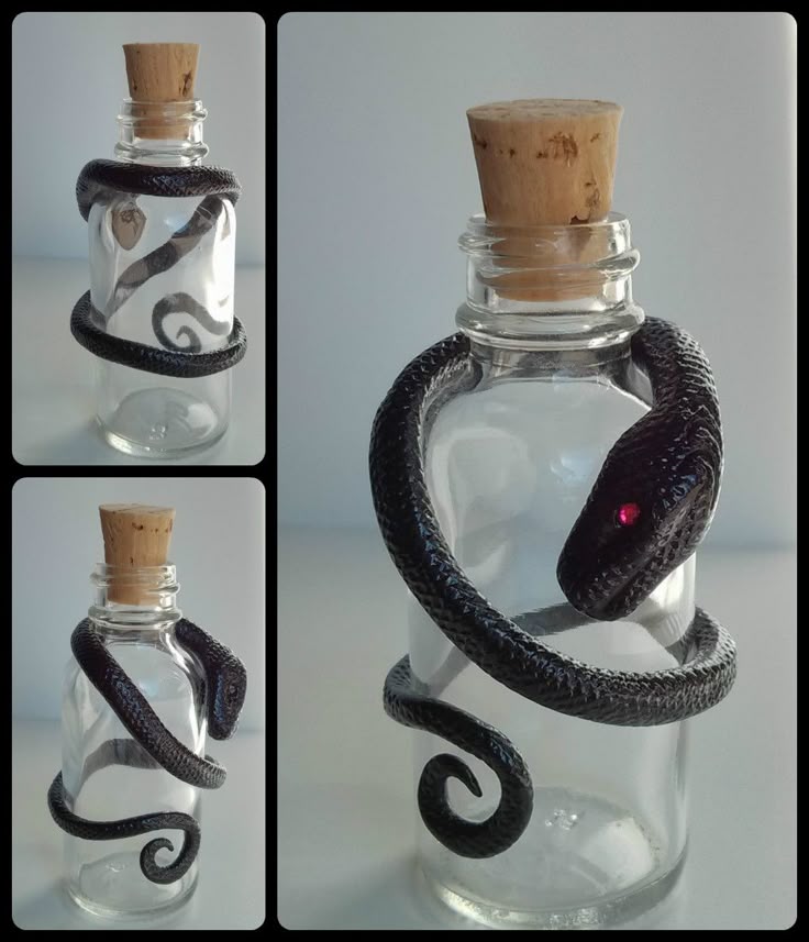 make with rubber snake handmade black polymer clay snake with deep pink rhinestone eyes wrapped around a clear glass bottle with cork seal halloween deco