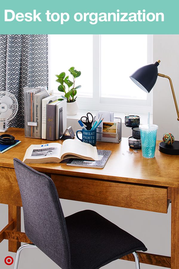 Keep your desk organized and clutter-free with a variety of cool storage options. A coffee mug with a fun quote adds personality and is a great place to hold pencils, pens and highlighters. Add a desk lamp for late-night study sessions and other desktop organization to keep notes, paper clips and other stuff in its place.
