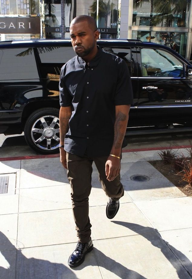 Kanye West wears Saint Laurent Signature Lace-Up Boots | UpscaleHype