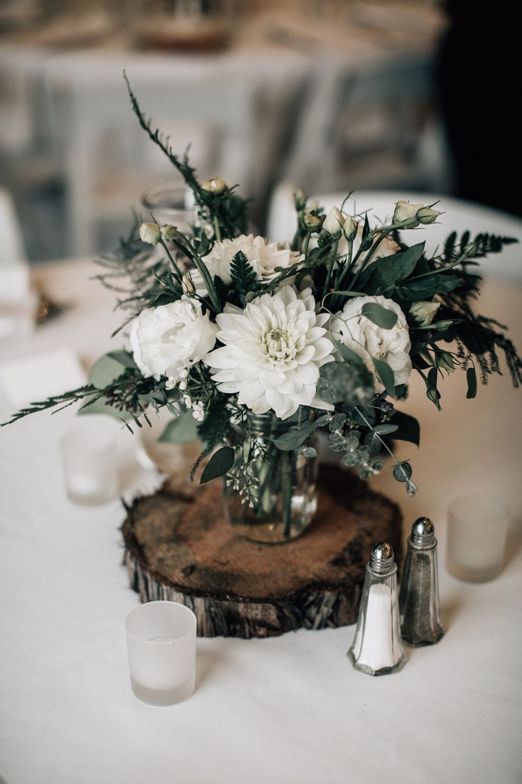 wood round centerpiece mason jar centerpieces white and green wedding