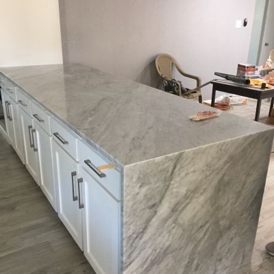 Waterfall Carrara Marble Kitchen Countertop Econ Granite Dallas Tx Waterfall Carrara Marble Kitchen Countertop Econ Granite Dallas Tx 2144340974 Econgranite Countertops Quartzite Table