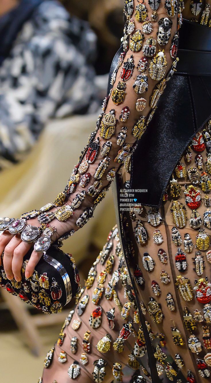 Alexander McQueen Fall18 Details and to see her earrings click the link Alexander McQueen Fall18 Details and to see her earrings click the link