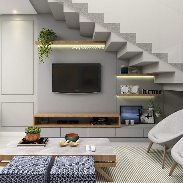 painel de tv em baixo da escada tambem pode ser charmoso alem de aproveita be understairs st stairs in living room home stairs design living room design modern