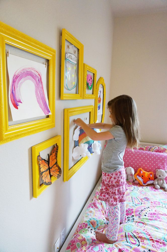 Paint empty frames in bright colors and then you can substitute out Lilly's art or your coloring book pages