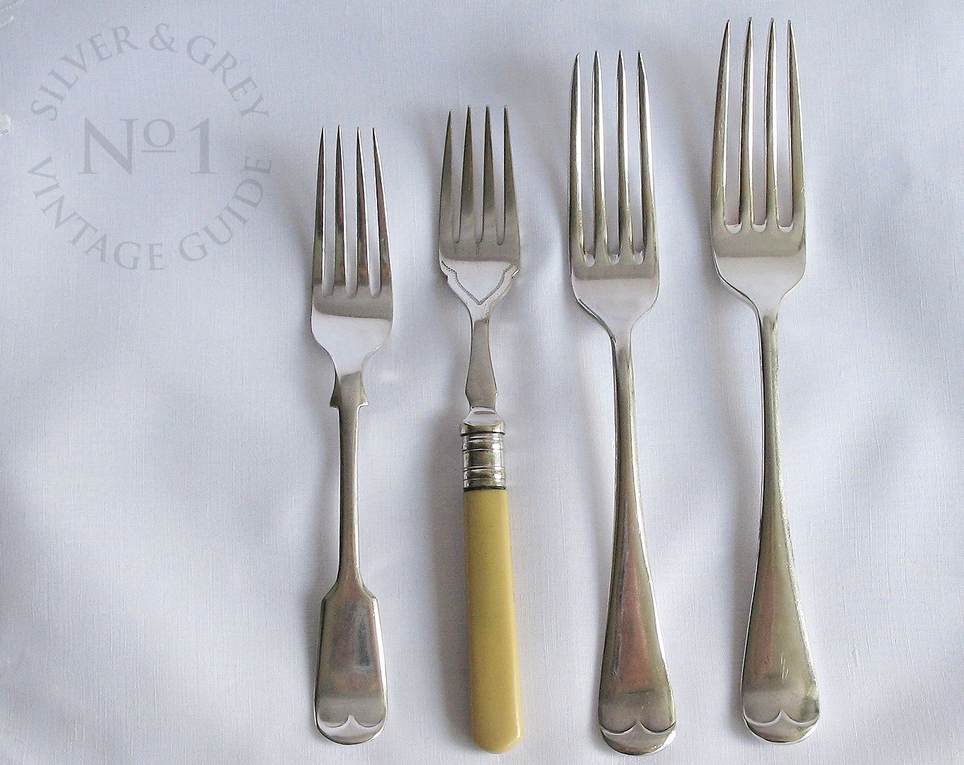 Comparing Different Vintage Fork Sizes From Left To Right Dessert comparing-different-vintage-fork-sizes-from-left-to-right-dessert