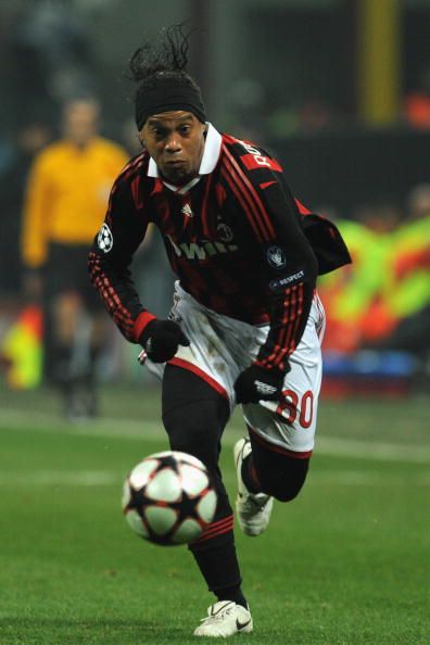 Ronaldinho of AC Milan celebrates the opening goal during the UEFA