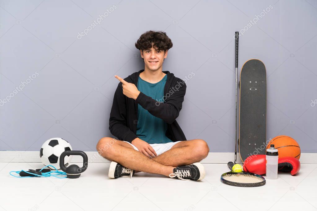 Young Handsome Man Sitting On The Floor Doing Silence Gesture Ad Sponsored Man Handsome Young Sitting Man Sitting Handsome Men Photo Editing