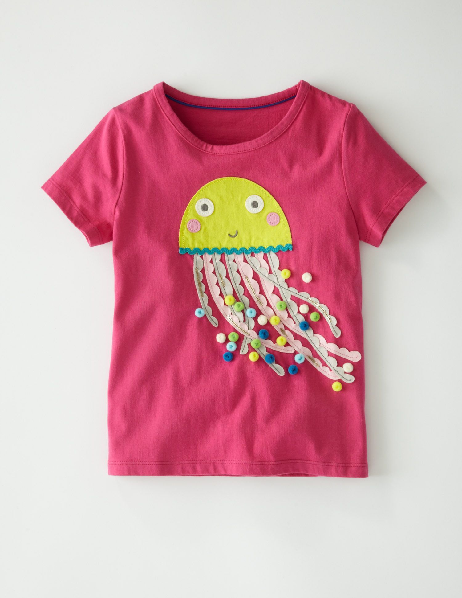 A sumptuous T-shirt with a generous helping of trims and sequins to give an exot...