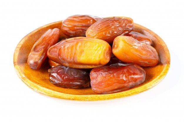 Dates palm fruit arranged in shape of crescent moon. ramadan kareem. | Premium Photo Date Palm, White Background, Wooden Background, Wooden Bowls, Media Marketing, Marketing Tips, Dating, Ramadan Kareem, Vegetables