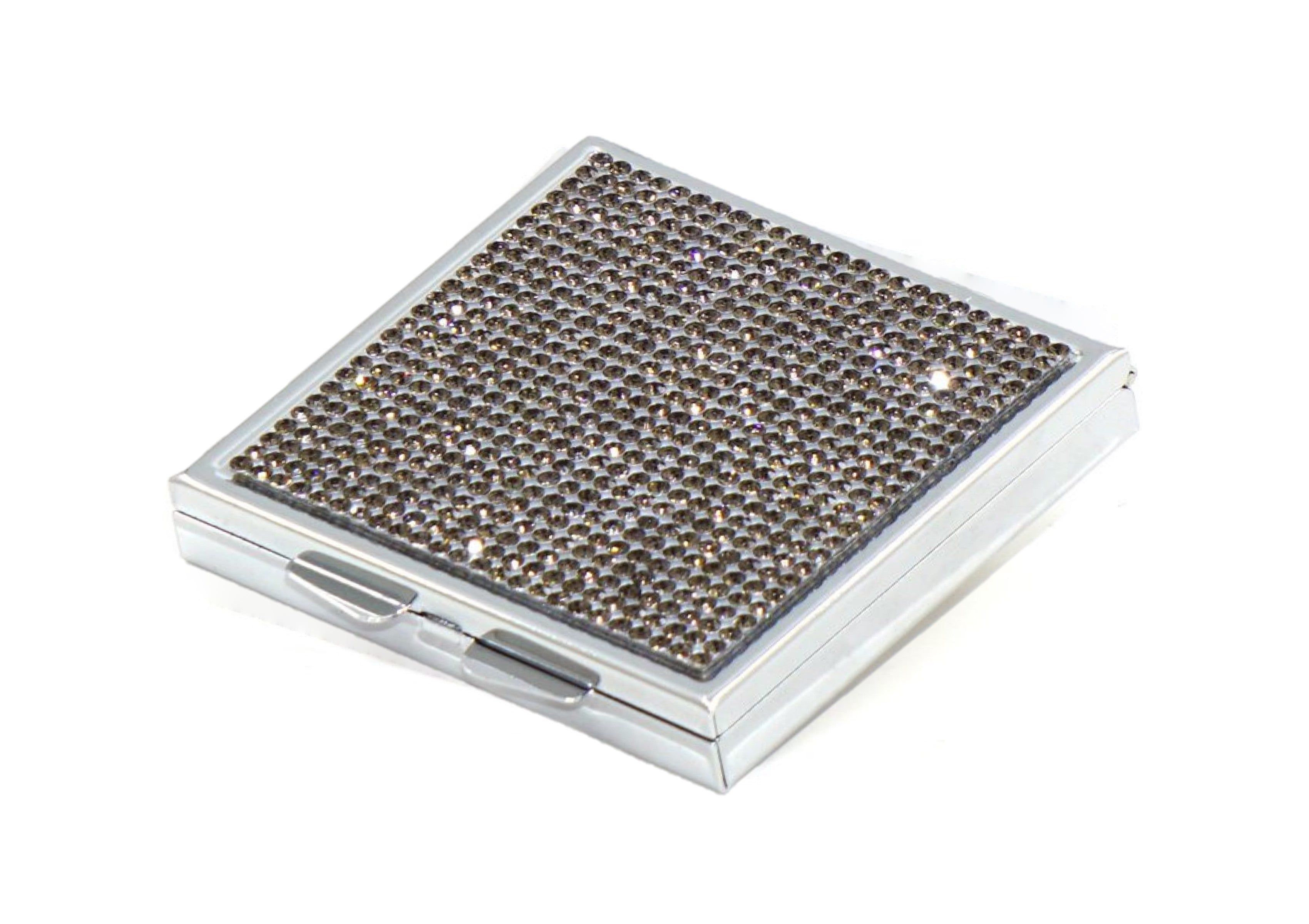 Complete your crystal-studded organizers with our inlaid pill cases.Available in 2, 3, 4, 6 and 7 slot options in square or rectangle, the flip cover is blanketed with Black Diamond Crystals. A front tab makes for easy access to contents. Peridot Crystal, Rose Gold Crystal, The Dark Crystal, Green Peridot, Diamond Crystal, Black Crystals, Purple Amethyst, Aquamarine, Blue Sapphire