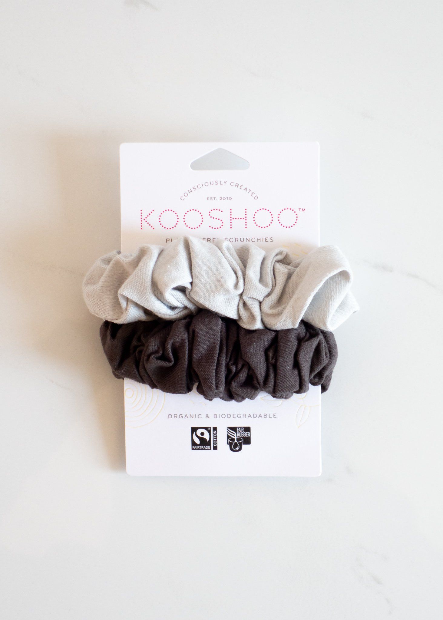 The most responsibly made scrunchies ever! These stylish Scrunchies are made of just two natural materials: Fairtrade & GOTS certified organic cotton and Fair Rubber Association certified natural rubber. Not only does that make them 100% fair trade, but it also makes them 100% plastic-free and biodegradable. They're dyed using GOTS organic dyes and packaged using FSC certified recycled paper. They have a strong, all-day hold yet gentle on hair and have more stretch than other scrunchies, giv Paper Packaging, Packaging Design, Gots Certified, Certified Organic, Organic Dyes, Organic Cotton, Eco Store, Moon Shadow, Eco Friendly Packaging