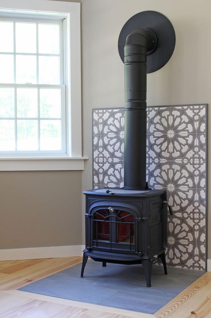 Wonderful Photographs Fireplace Remodel stucco Strategies If your room has a hearth, it is usually the focal point of the room. Update the fireplace with cont #Fireplace #Photographs #Remodel #Strategies #stucco #Wonderful Wood Stove Wall, Corner Wood Stove, Wood Stove Surround, Wood Stove Hearth, Wood Stove Fireplace, Fireplace Tile Surround, Fireplace Hearth, Corner Fireplace, Fireplace Remodel