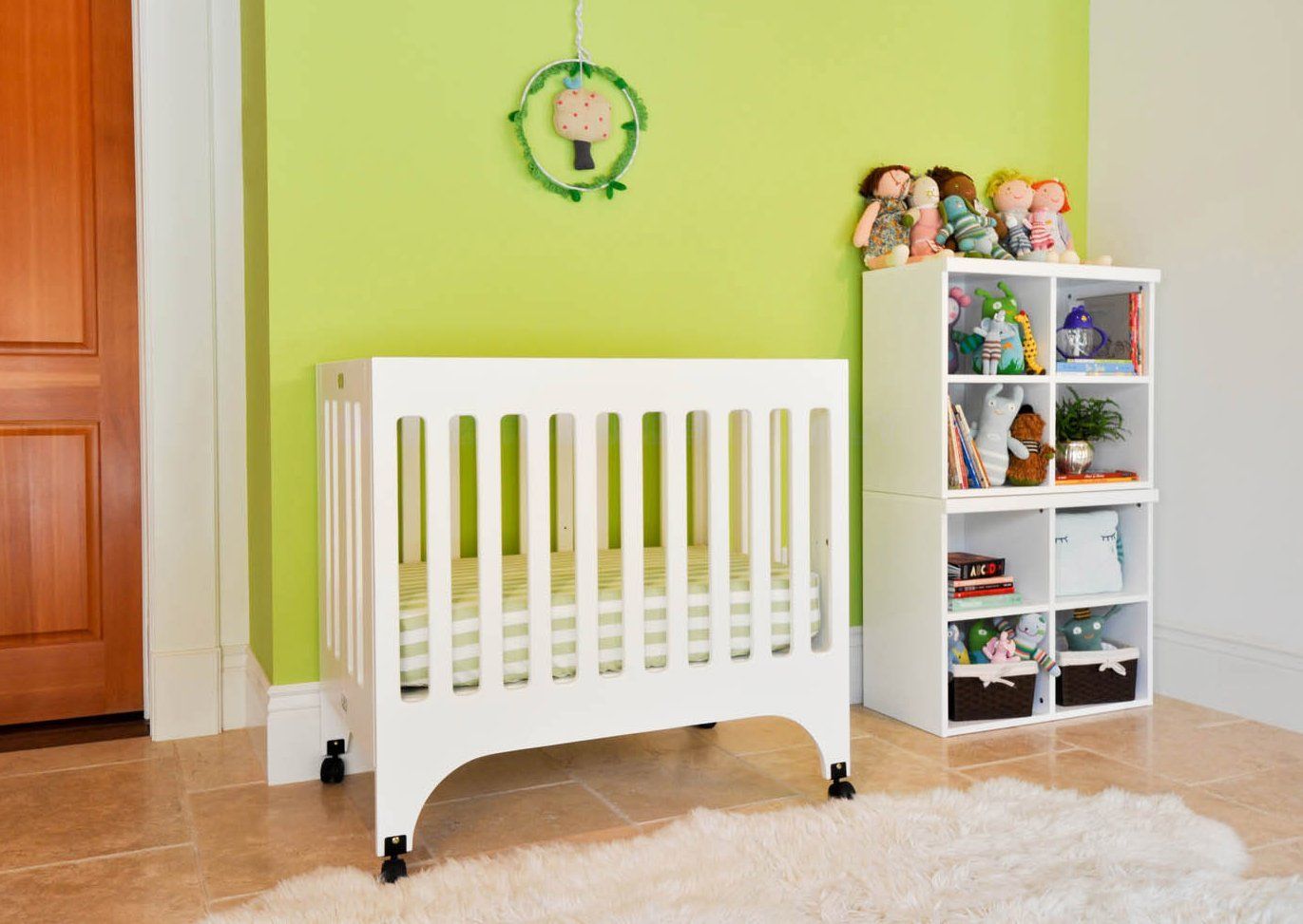 babyletto Grayson Mini Crib with Mattress Pad, White Baby