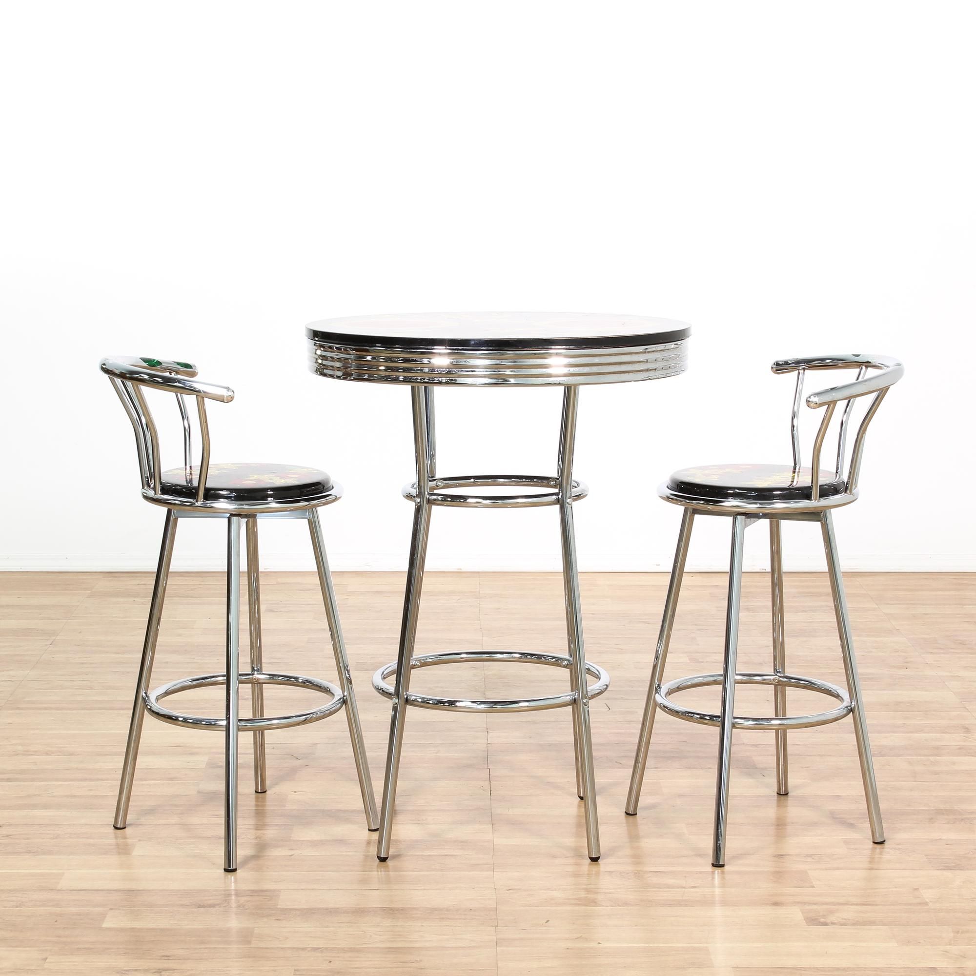 this cafe table set is featured in a shiny polished chrome this