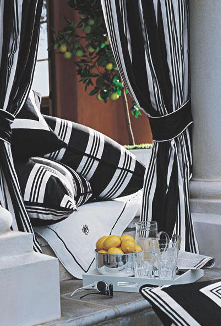 Ralph lauren home black and white striped fabric creates a chic bold cabana
